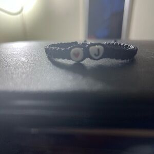 I am poshing handmade letter bracelets